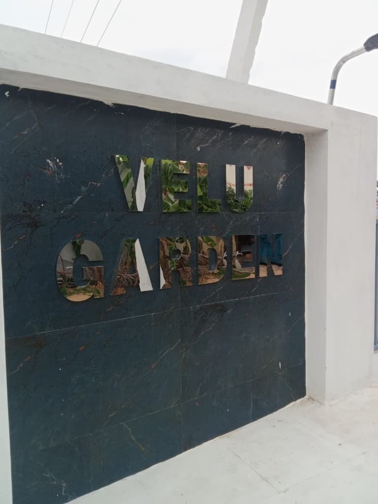 Velu Garden metallic entrance sign