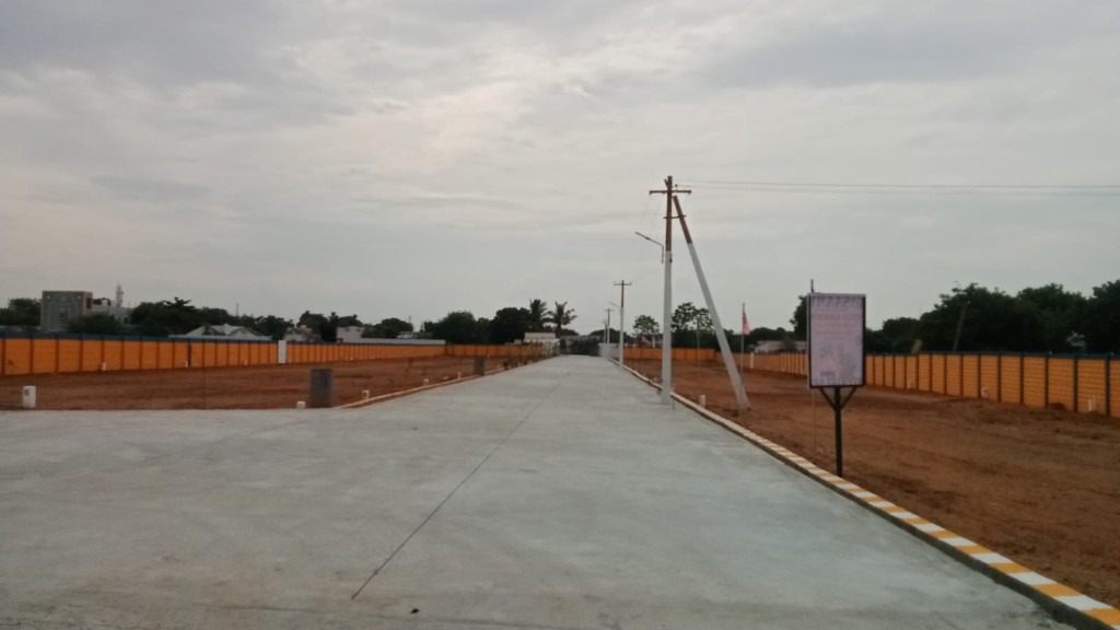 Velu Garden road approach with plot layout
